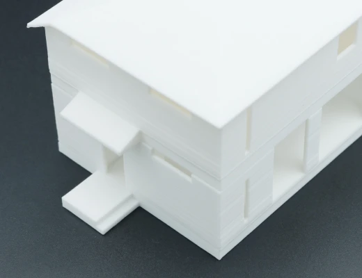 画像:3Dモデリングで作成した白い二階建ての住宅模型